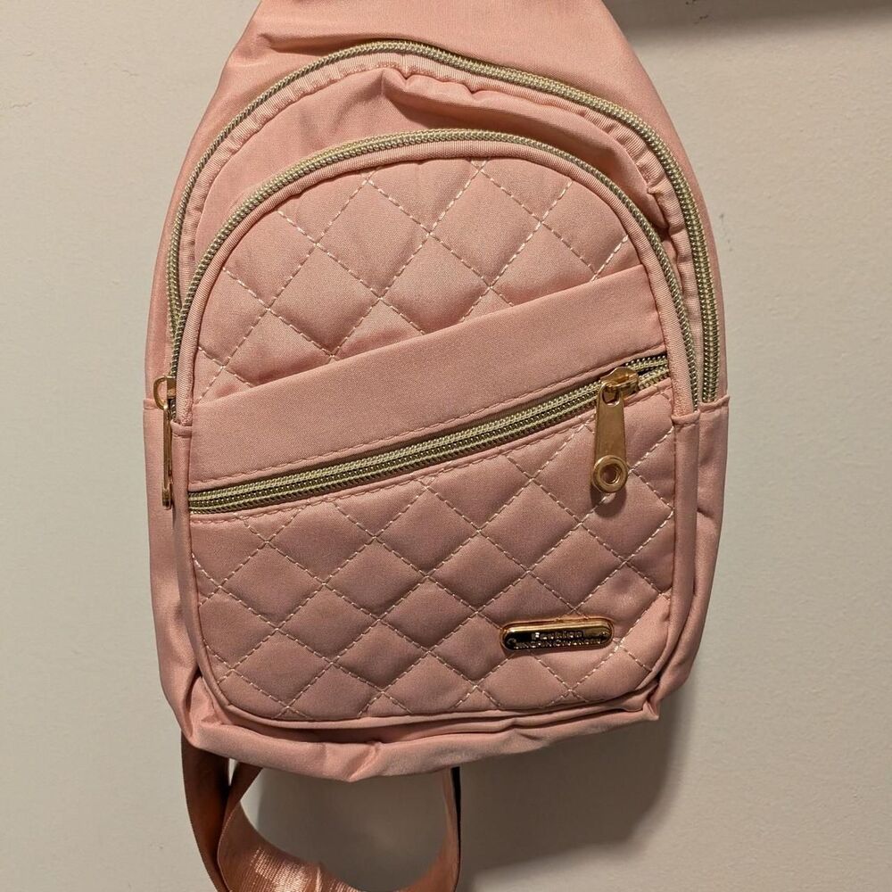 Pink quilted backpack/shoulder bag